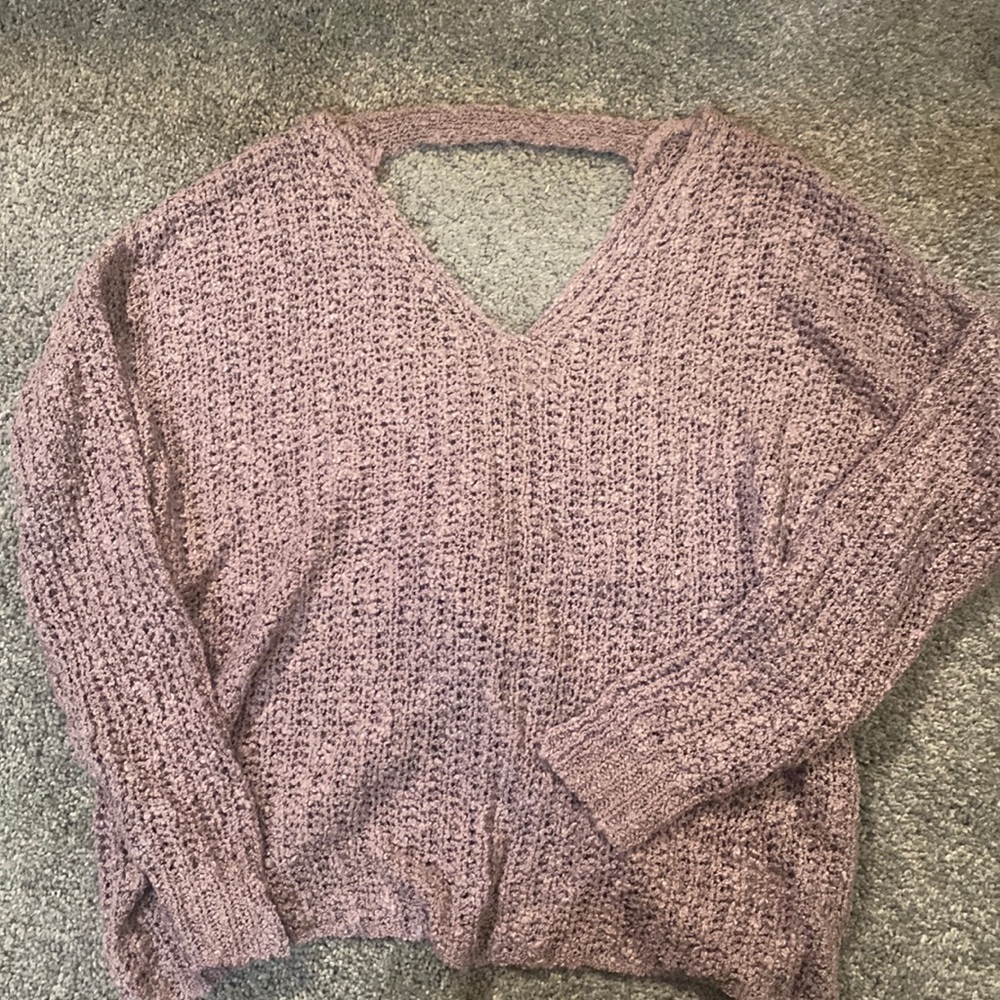 Pink sweater with twist, open back design!